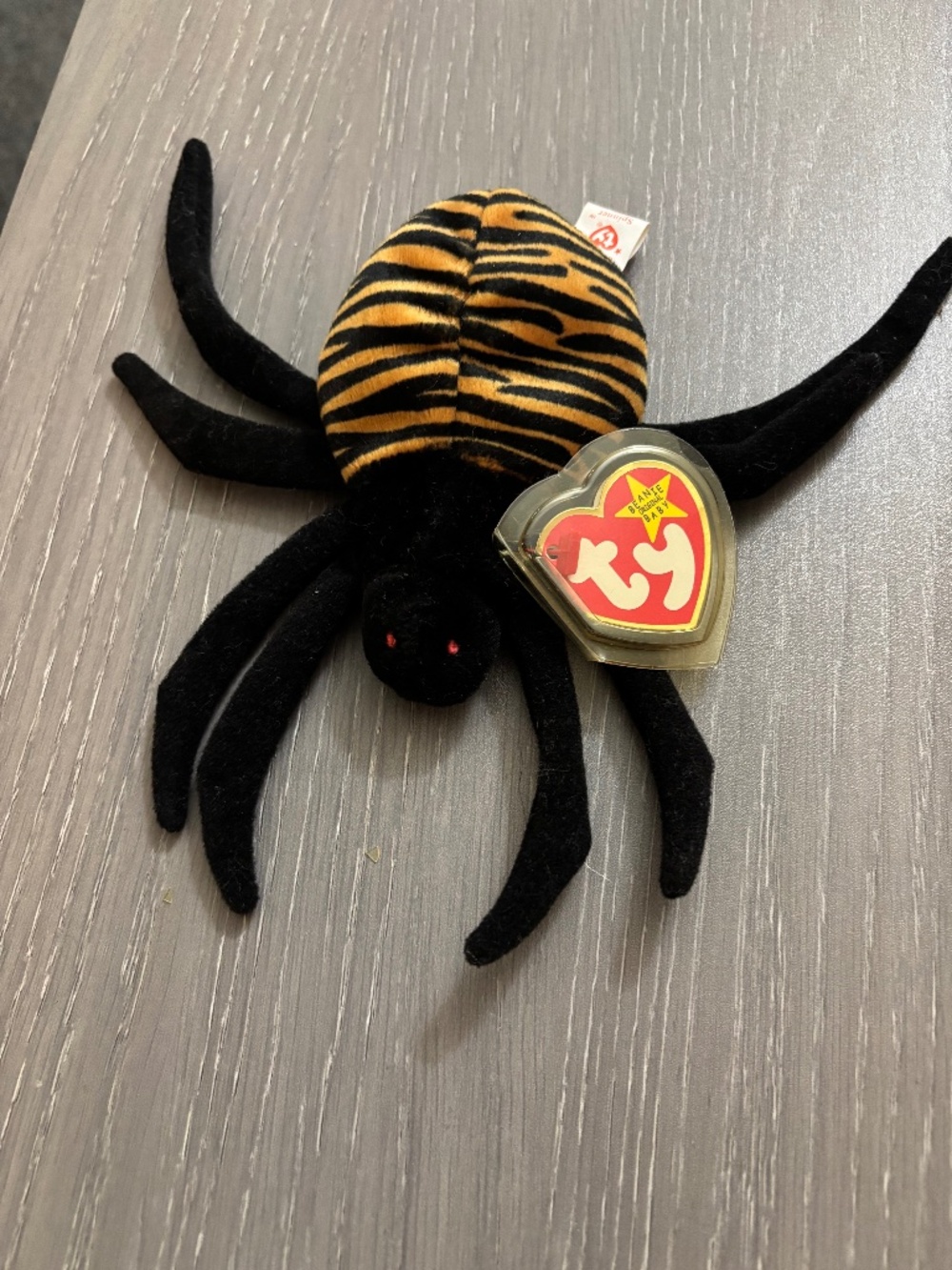 TY beanie baby spinner the spider in new condition with tags